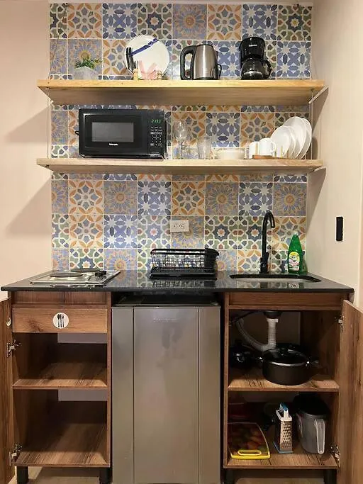 Apartamento En Planta Baja Cerca A Laureles Nid103 By Roots Rentals Medellin 0*,  Colombia